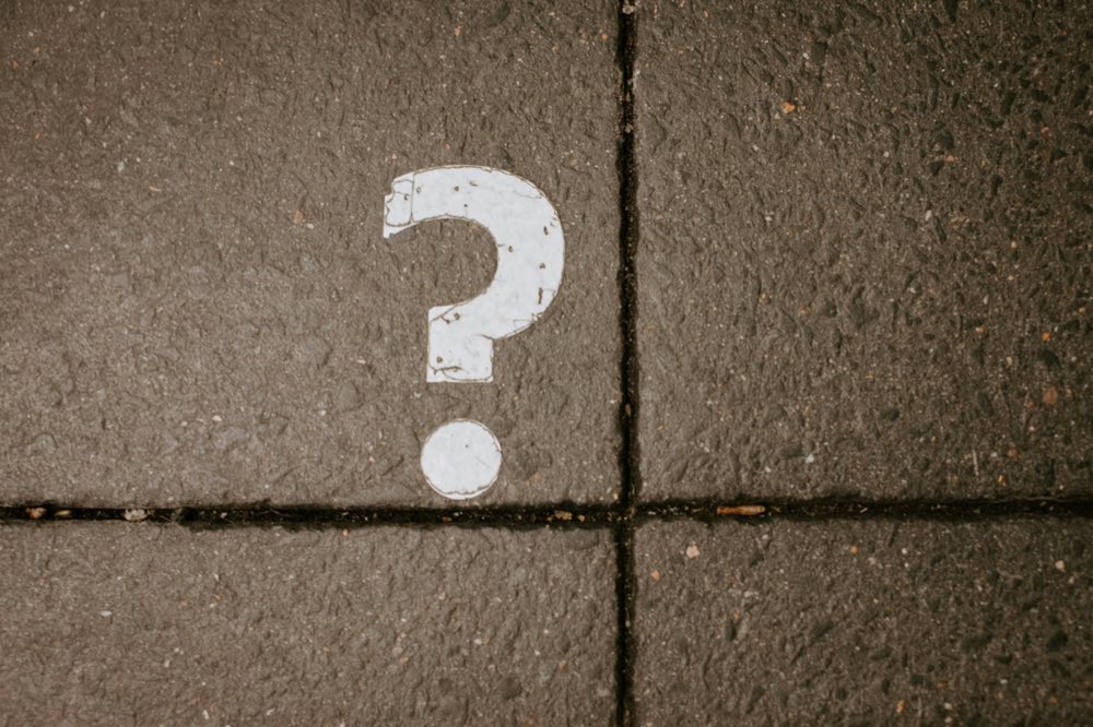 A question mark painted on pavement